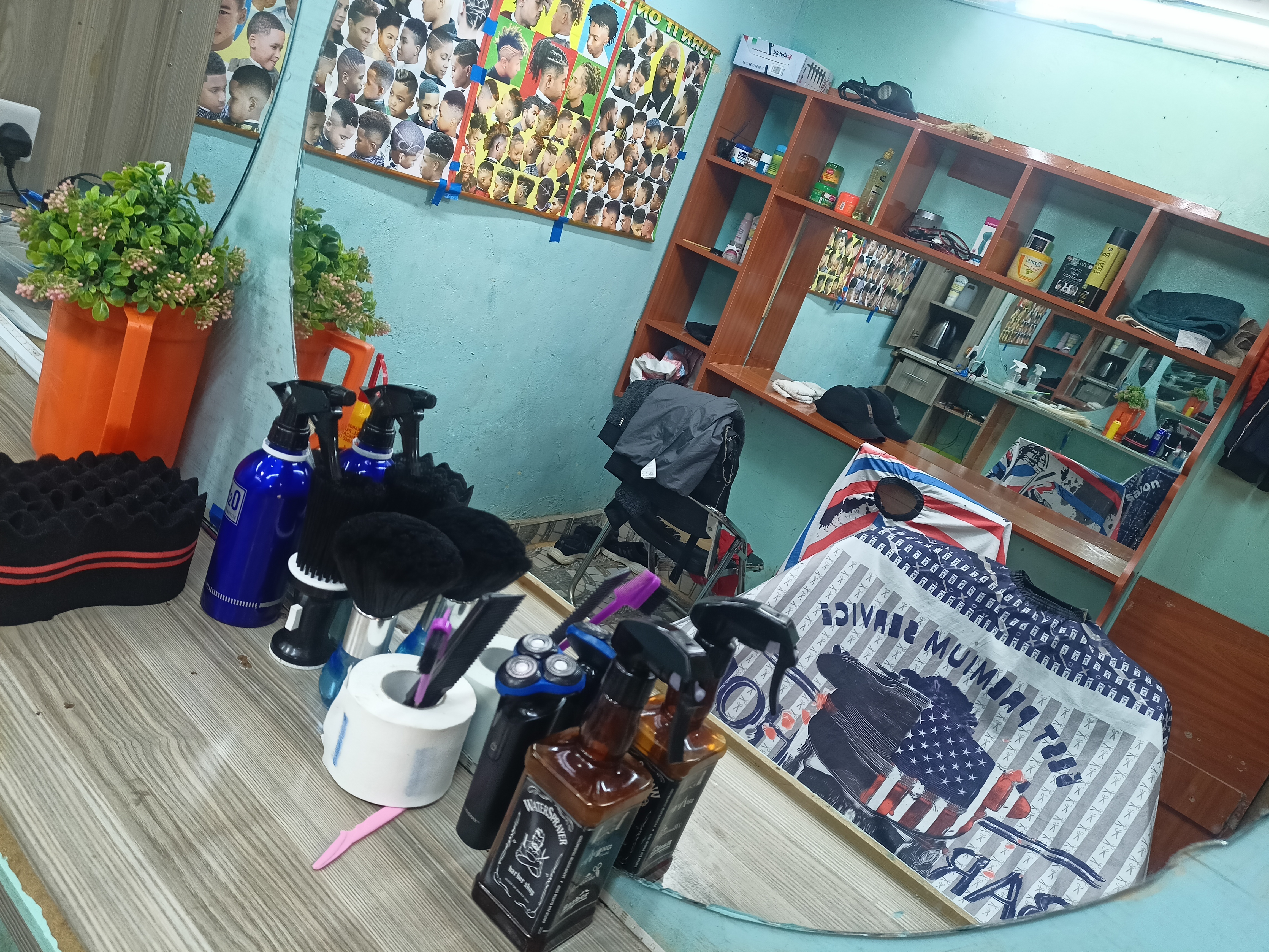 Experience Exceptional Grooming at JoStyles Central Lounge in Kapsabet